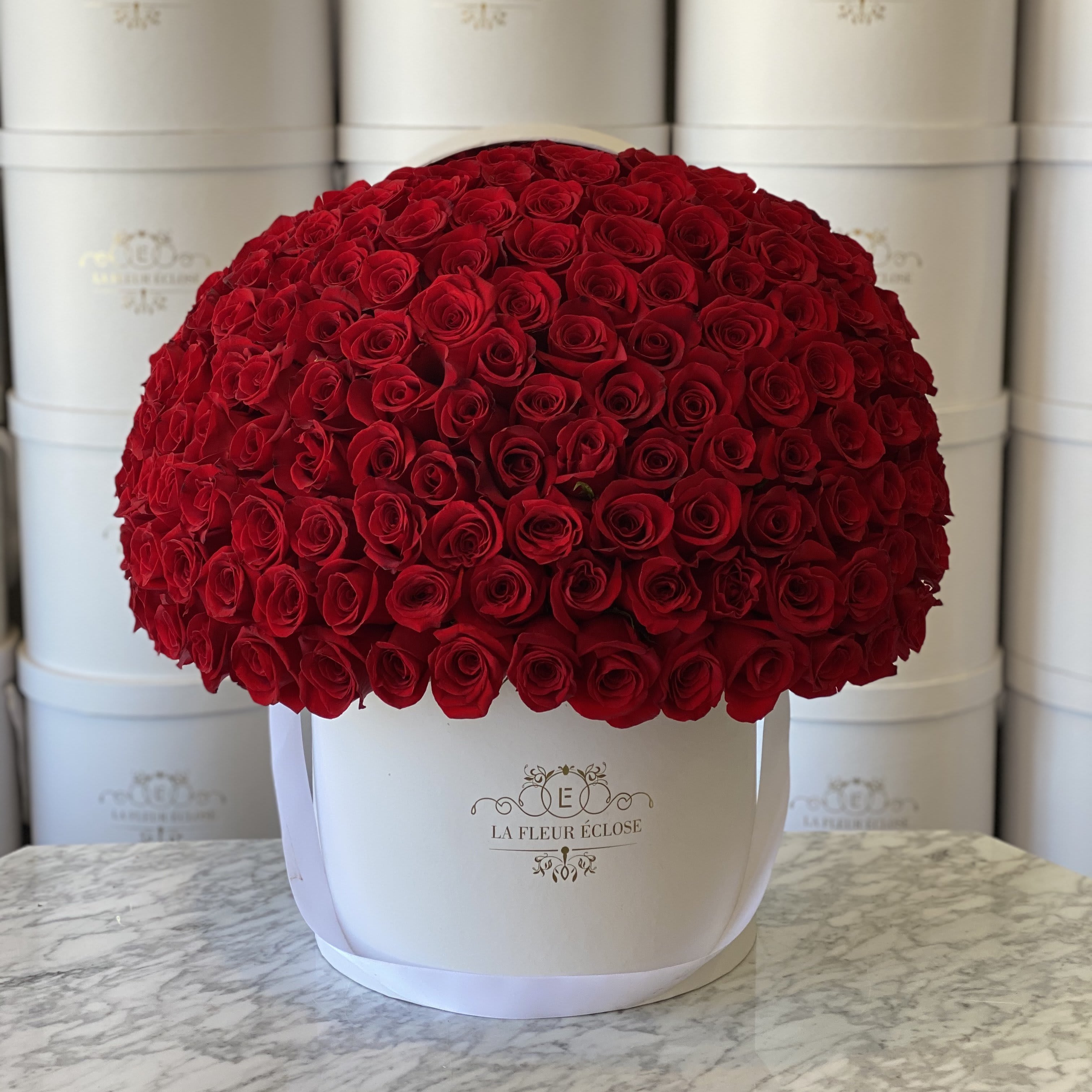 150 red roses - 150 roses in our signature box
