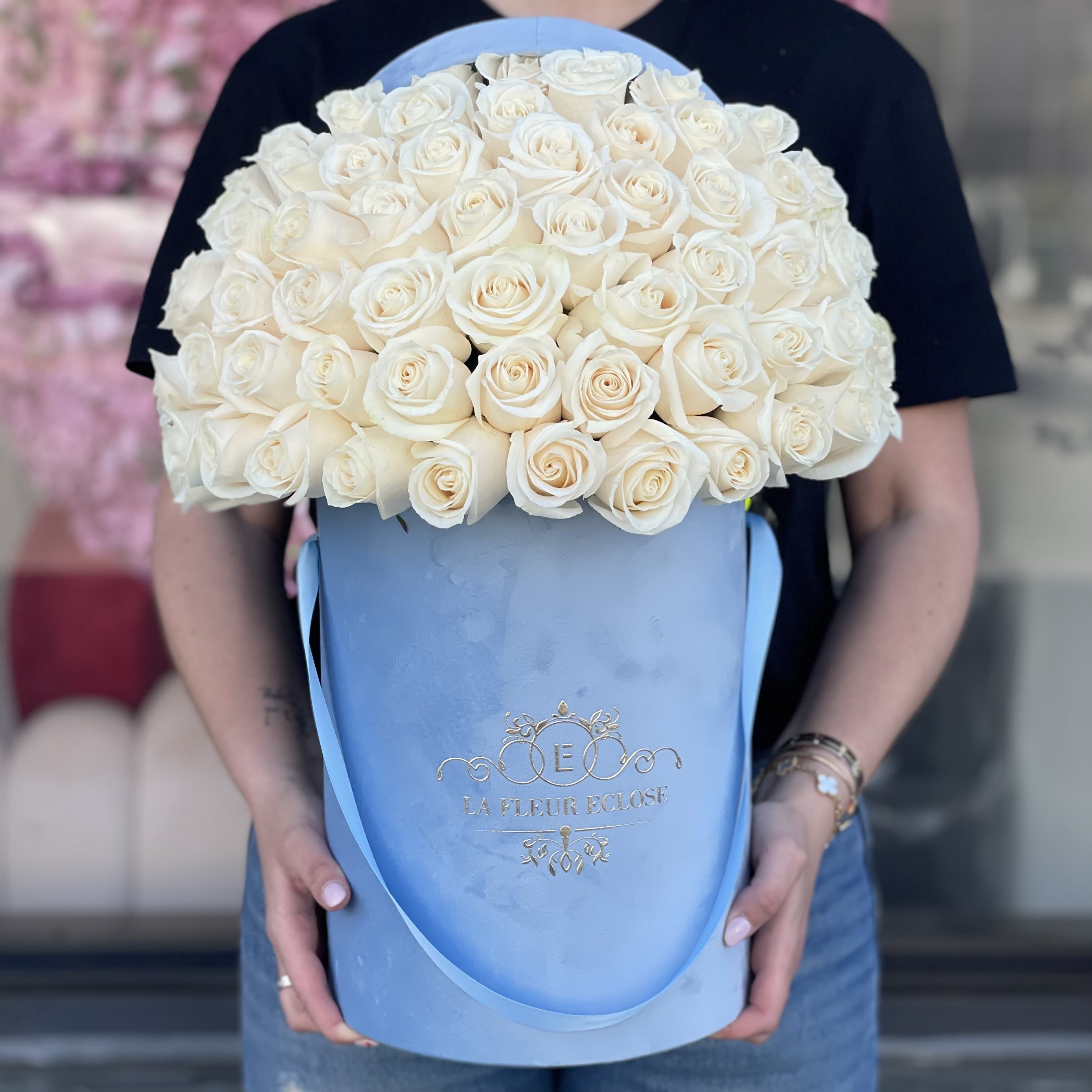 Happy Together MD  - FRESH CUT ROSES Standard 50 stunning white roses in our velvet blue box. Deluxe 75 stunning white roses in our velvet blue box.