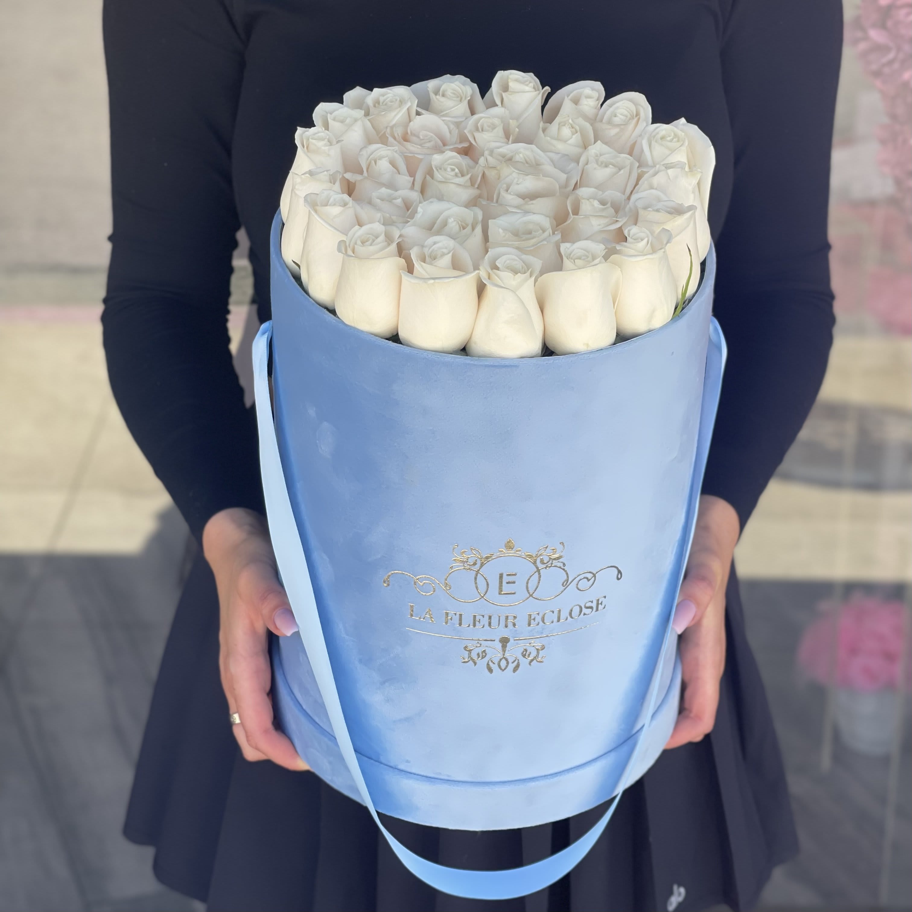Bella Ella MD - White roses in a velvet blue box. 