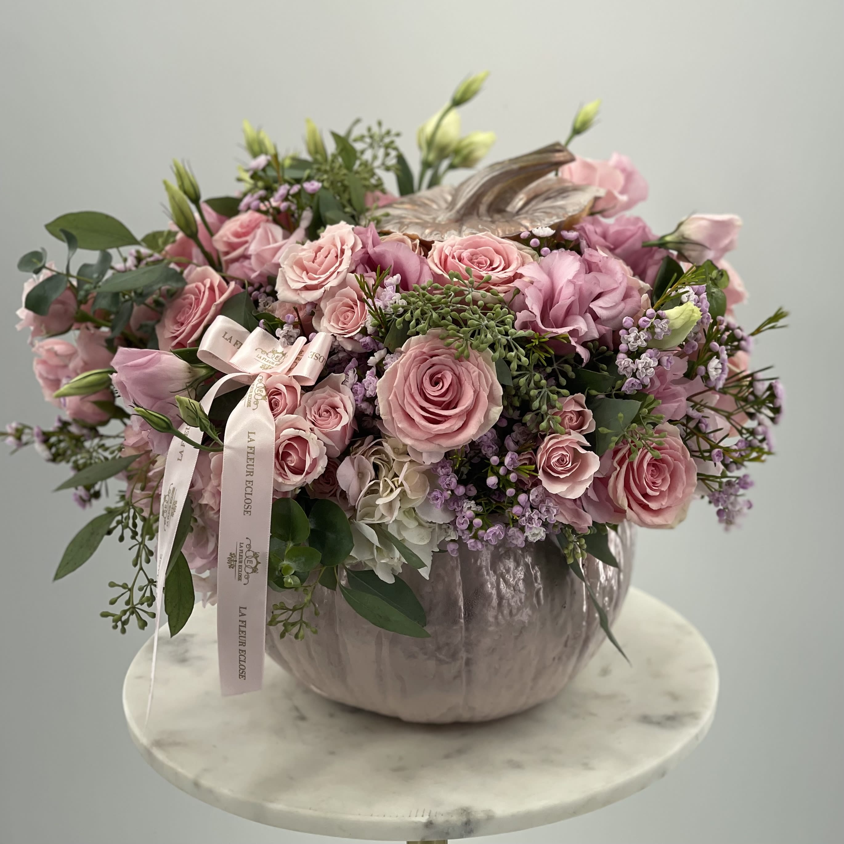 Bombshell  - mix of flowers in the pumpkin 