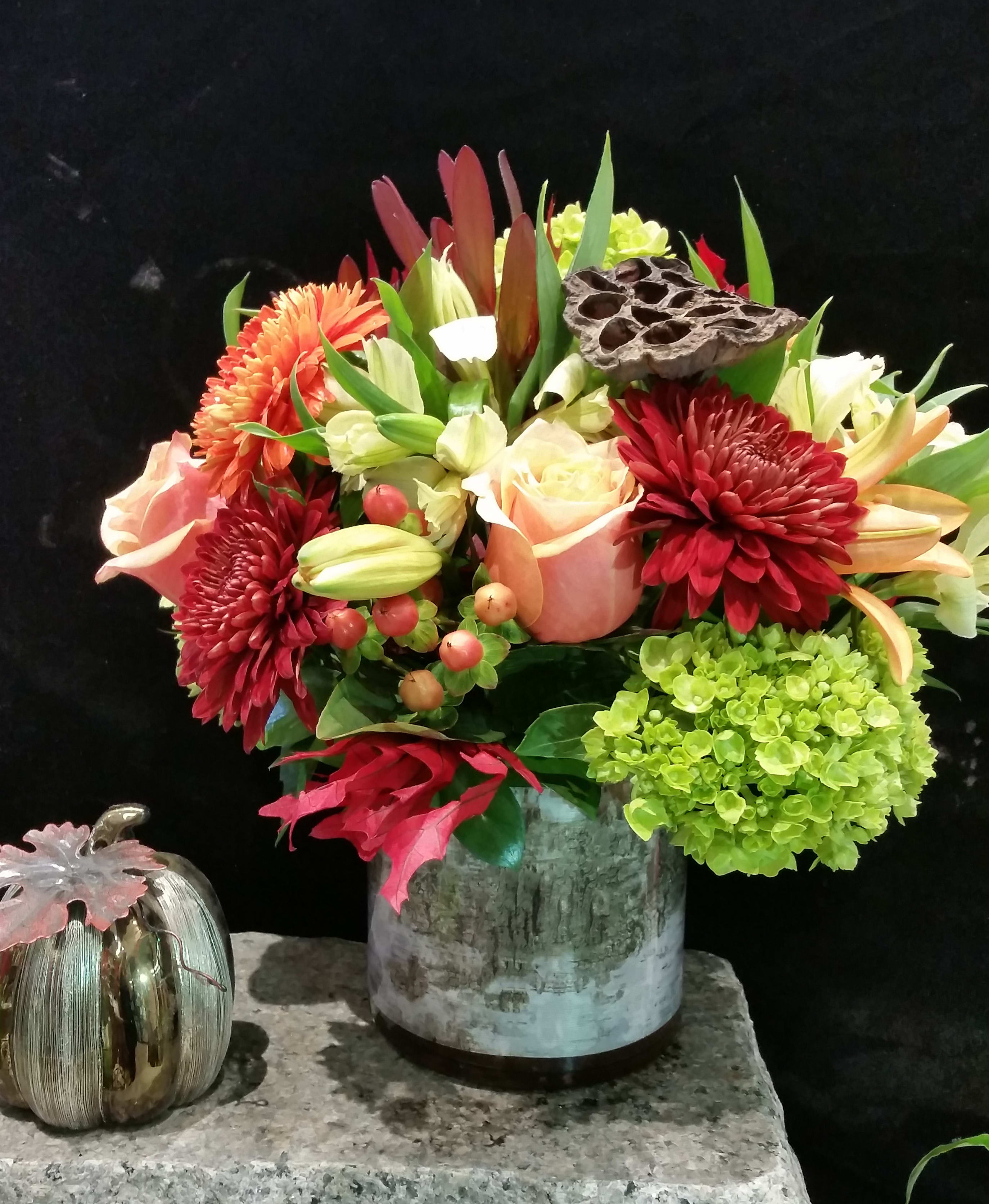 Bloom and Birch - We couldn't say it any simpler.  A mass of incredible fresh, vibrant blooms rest atop a cylinder lined with our lovely premium birch print liner.  Birch is 'in' and we love the rustic touch it lends to arrangements this time of year.  For Thanksgiving as a centerpiece, hostess gift, or simply as a seasonal addition to your home decor, Bloom and Birch is a winner!