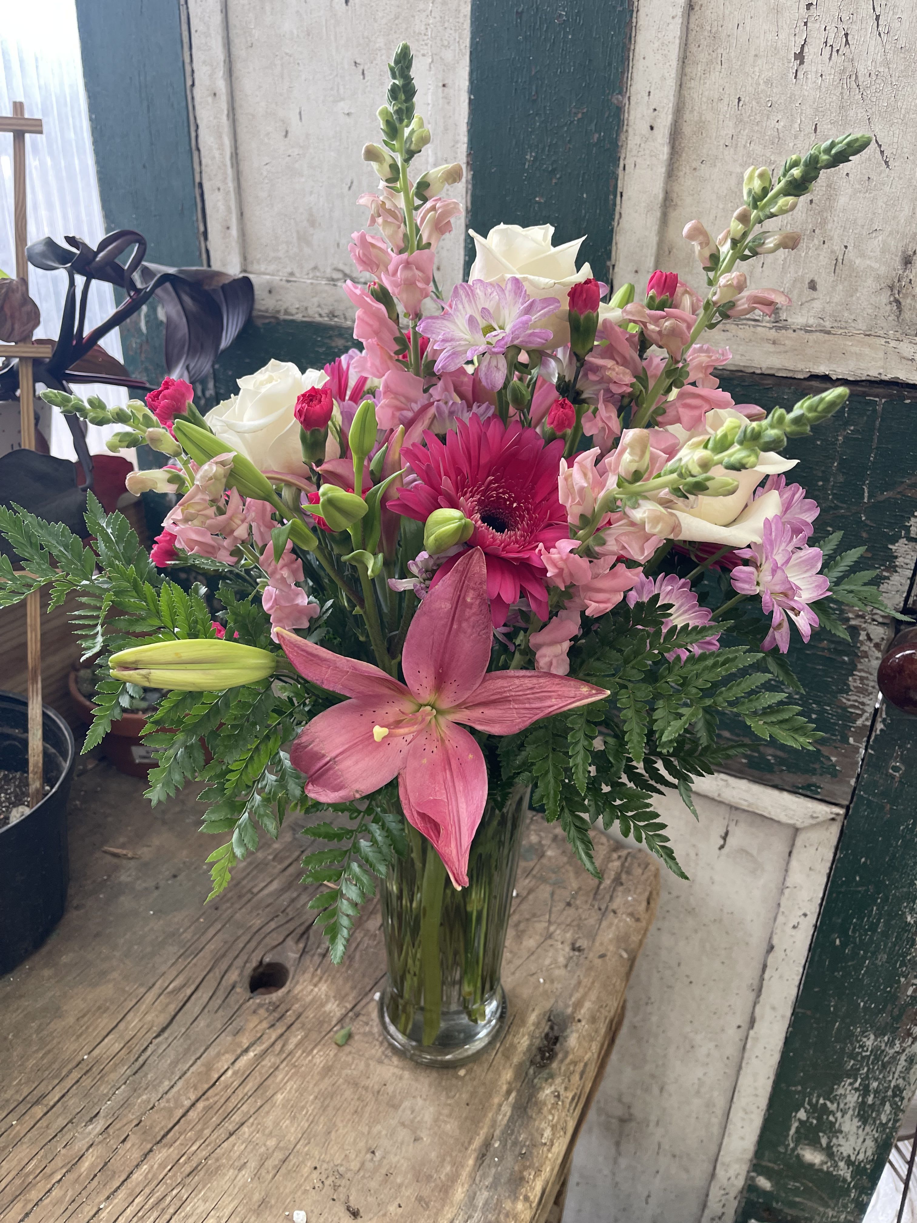 Awesome Anniversary - Show her how happy you are to have her in your life. A sparkling glass vase overflowing with our favorite flowers for your forever-favorite girl.