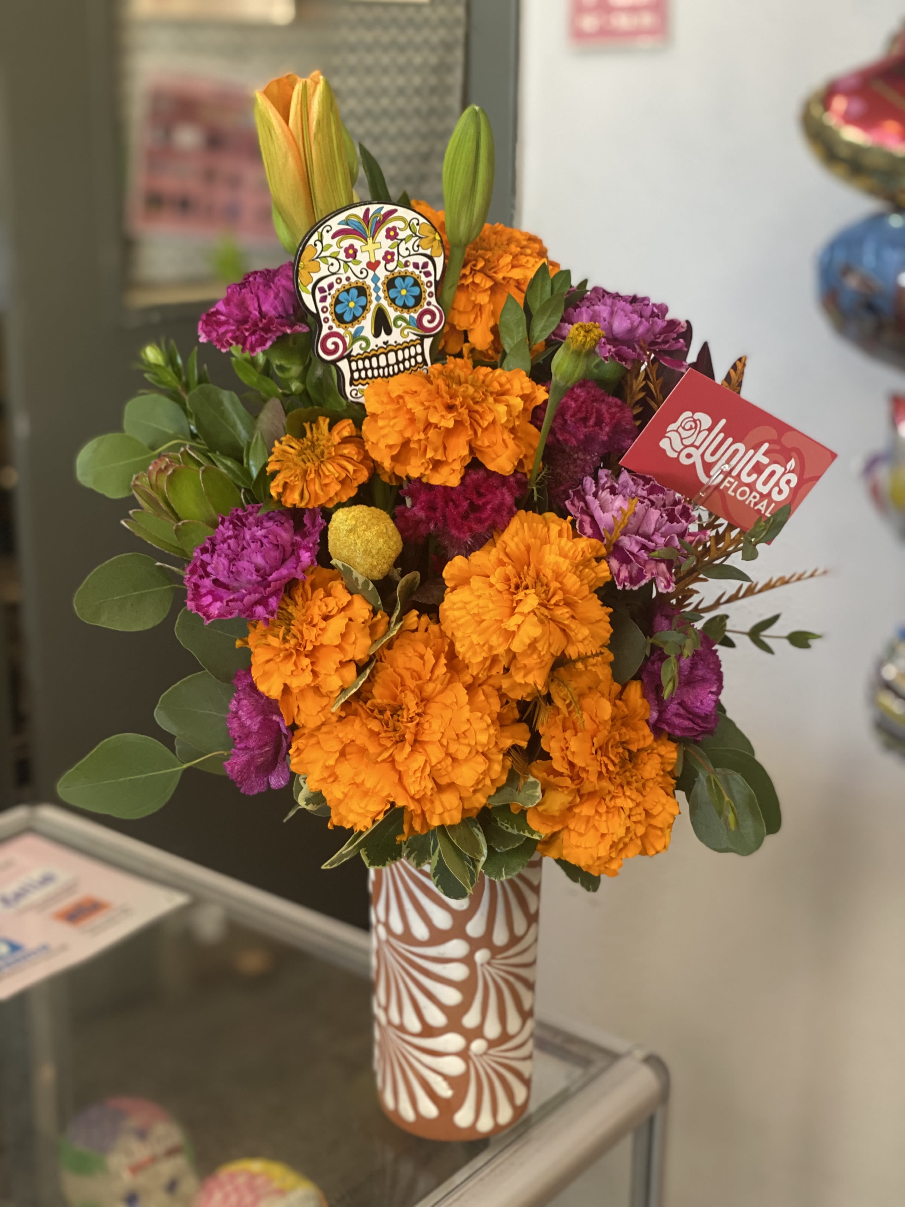 Talavera Cup  - Clay Tall Cup great to re-use. We will use longer lasting flowers. 