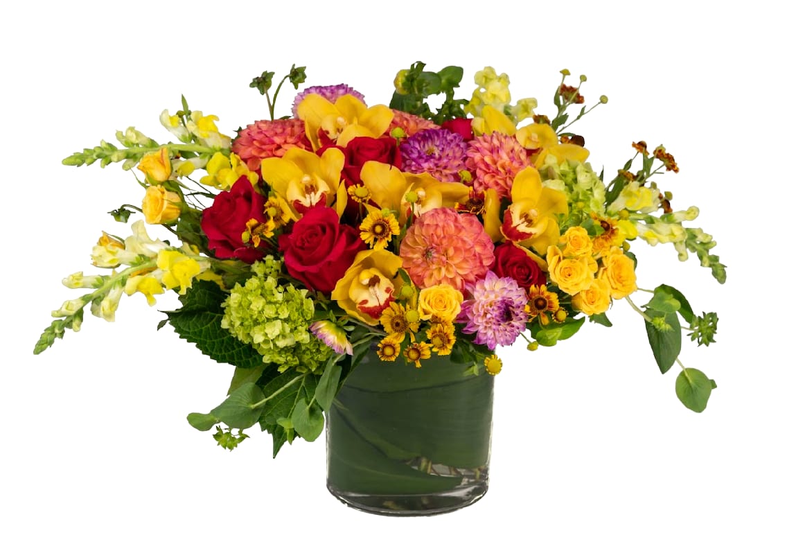 Sunny Paradise  - Orchids, dahlias, roses, green hydrangea, snap dragons and more designed in a leaf wrapped vase.   As Shown In Photo.