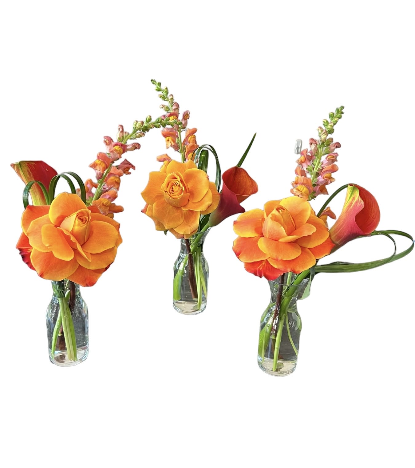 Trio Bud Vase - Three bud vase arrangements with orange roses, calla lily, snapdragon and greens.