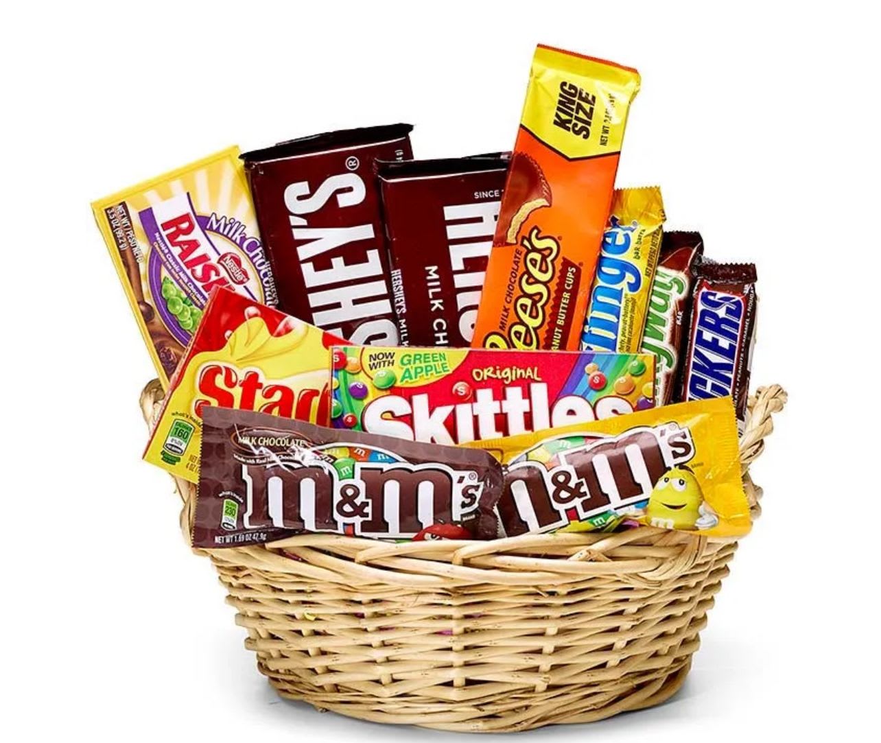 Basket filled with assorted candy bars and sweets