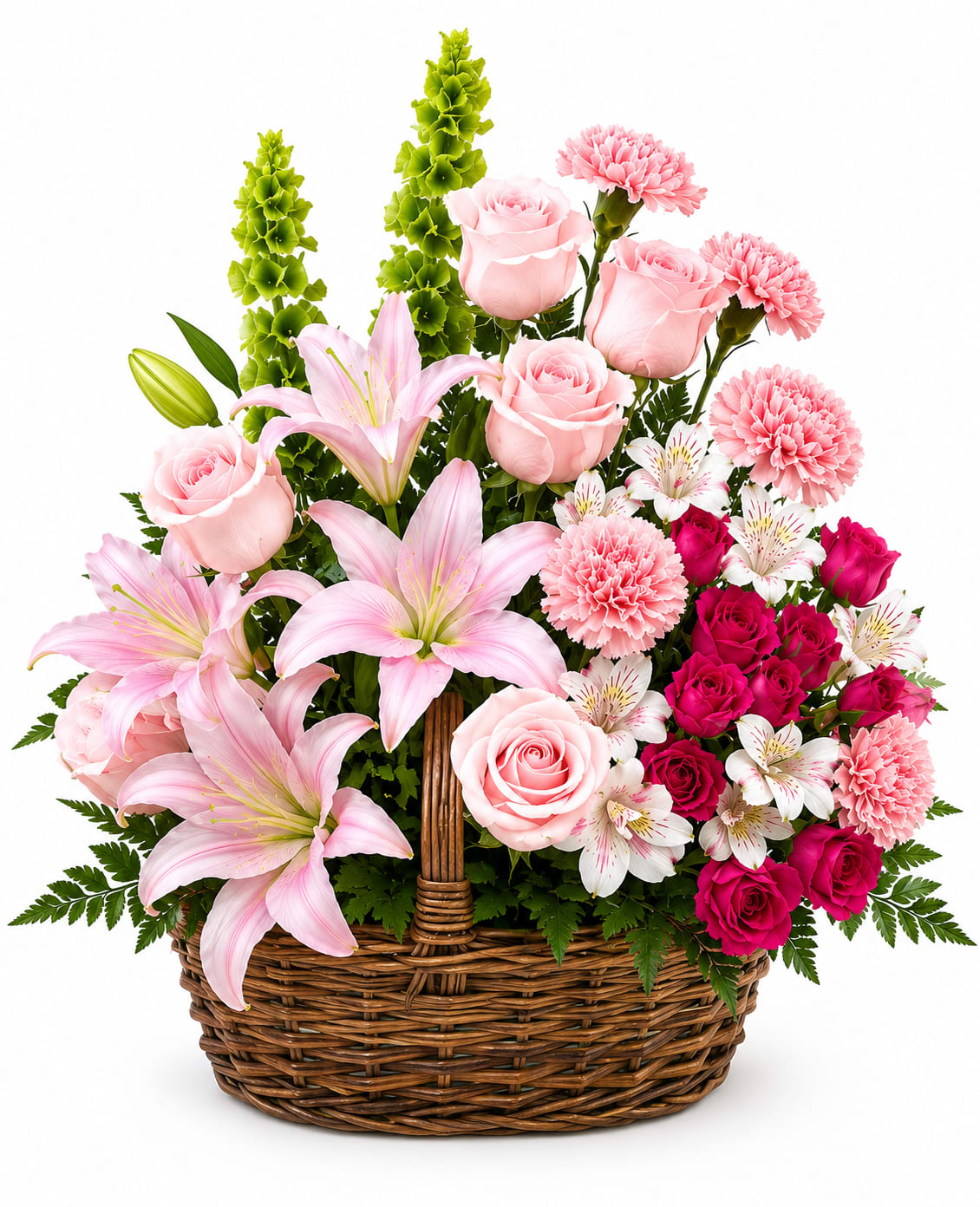 Blessings Basket - Soft pink roses and lilies mingle with bright pink carnations and white alstroemeria in a woven wicker basket, creating a gentle, garden-like sympathy arrangement that feels both comforting and hopeful. The Blessings Basket is arranged with tall green delphinium spikes rising behind the main cluster for height and layered texture - a design that reads as feminine and abundant, perfect for expressing condolences or sending a thoughtful bereavement gift.  This arrangement combines white, blue, pink, green, and touches of red tones across roses, lilies, carnations, alstroemeria, and delphinium for contrast and visual depth. Built on a 6" wicker basket base, it offers a full, rounded silhouette that sits well on a table, at a wake, or beside a casket. The colors and mixed blooms also make it appropriate for birthdays, thank-you gestures, or spring celebrations, and simple care - fresh water and a cool spot away from direct heat - will help the flowers remain beautiful through the occasion.
