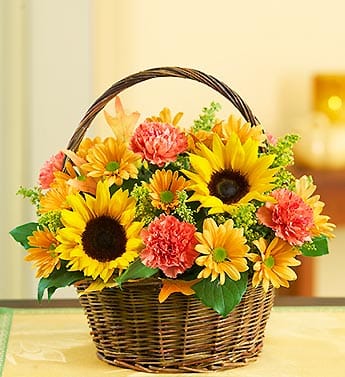 Basket of Fall - Bright and bold fall colored flowers arranged beautifully in a basket. A perfect way to thank you or to let someone special know you are thinking of them!