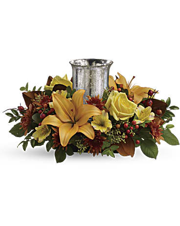 Glowing Gathering Centerpiece - A fabulous centerpiece for any fall occasion, Teleflora's elegant mercury glass hurricane shimmers and shines within a lush arrangement of roses and lilies.