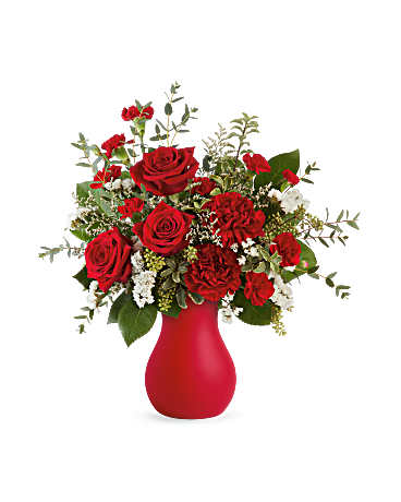 Red roses and carnations in a red vase