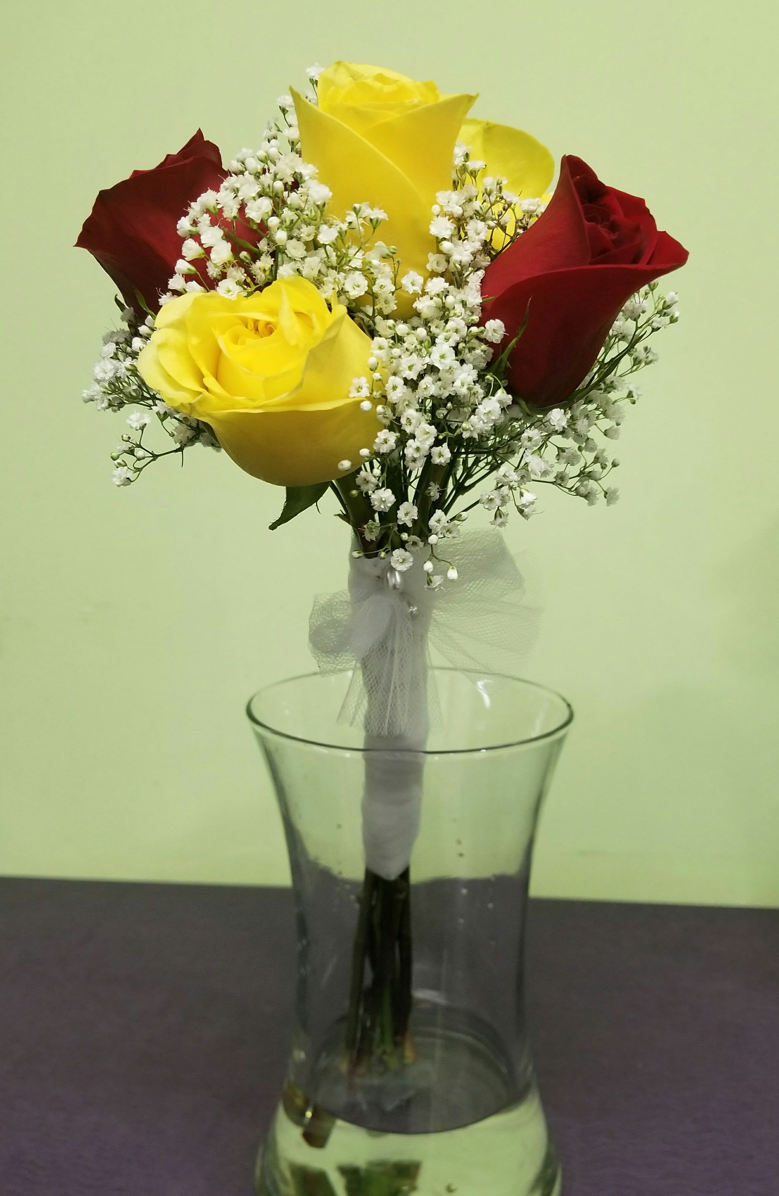 Red and Yellow Rose Bouquet - This is a simple handheld bouquet. Available in various colors!