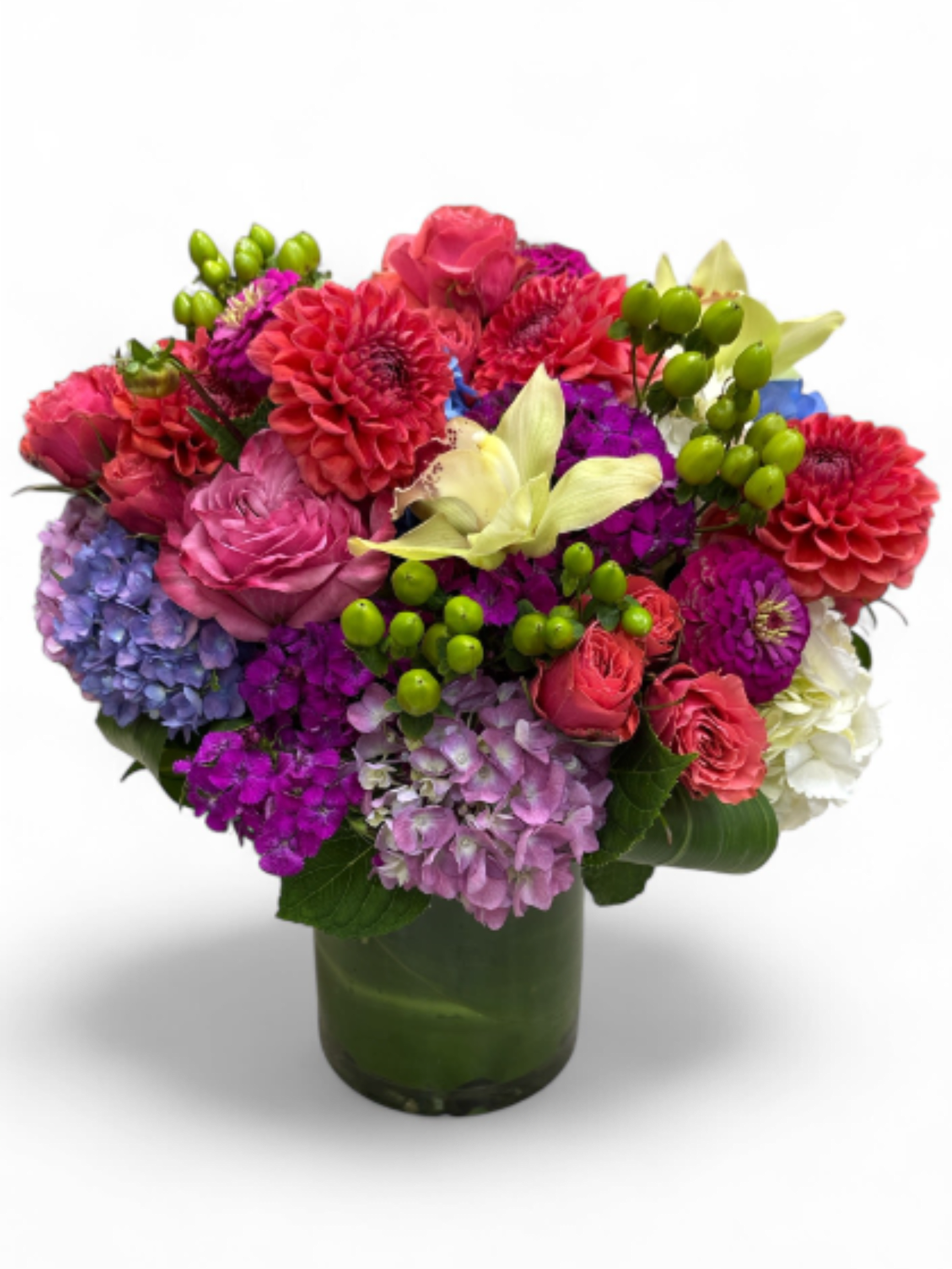Floral Tapestry  - Rich, bold and bright colors blend together to create a beautiful display in a tailored garden style arrangement.
