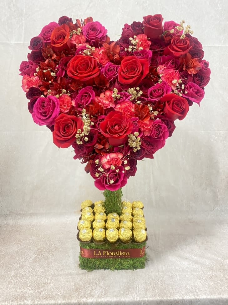 Heart-shaped rose arrangement with Ferrero Rocher chocolates on a square base
