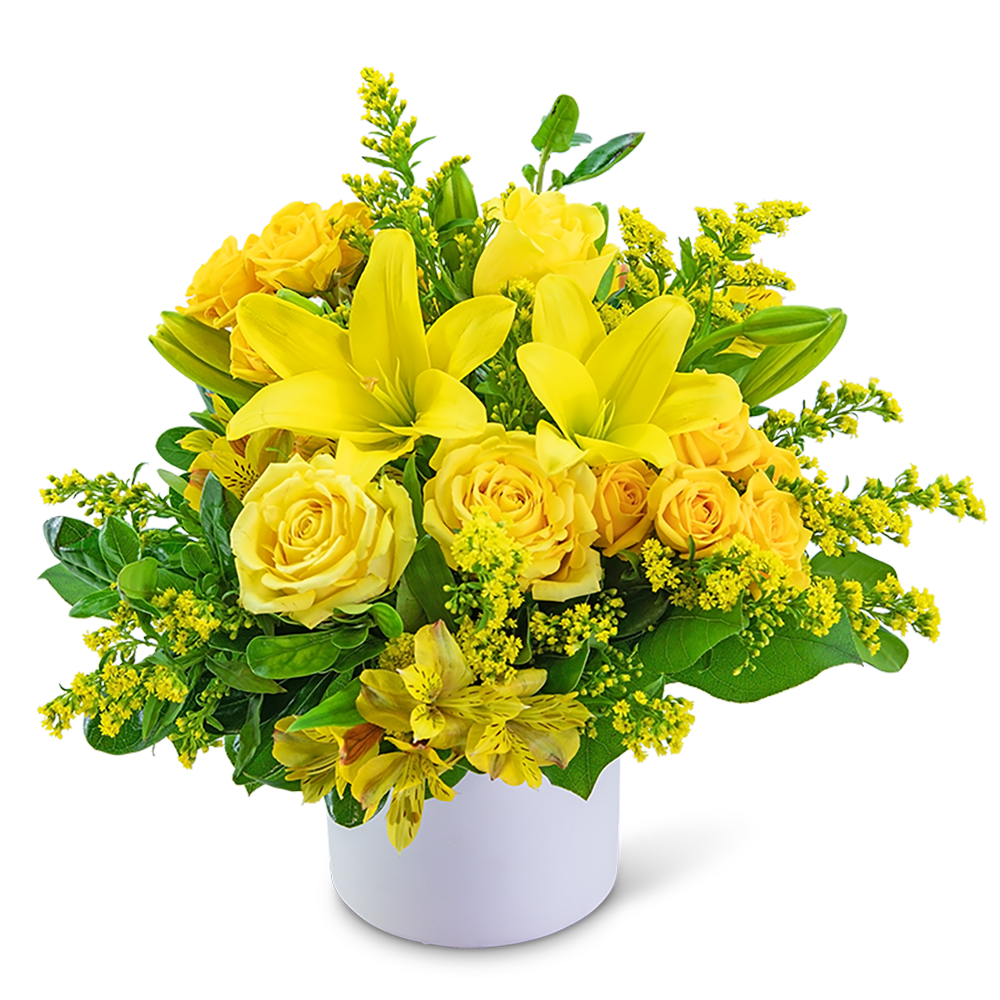 Yellow roses and lilies arranged in a white vase