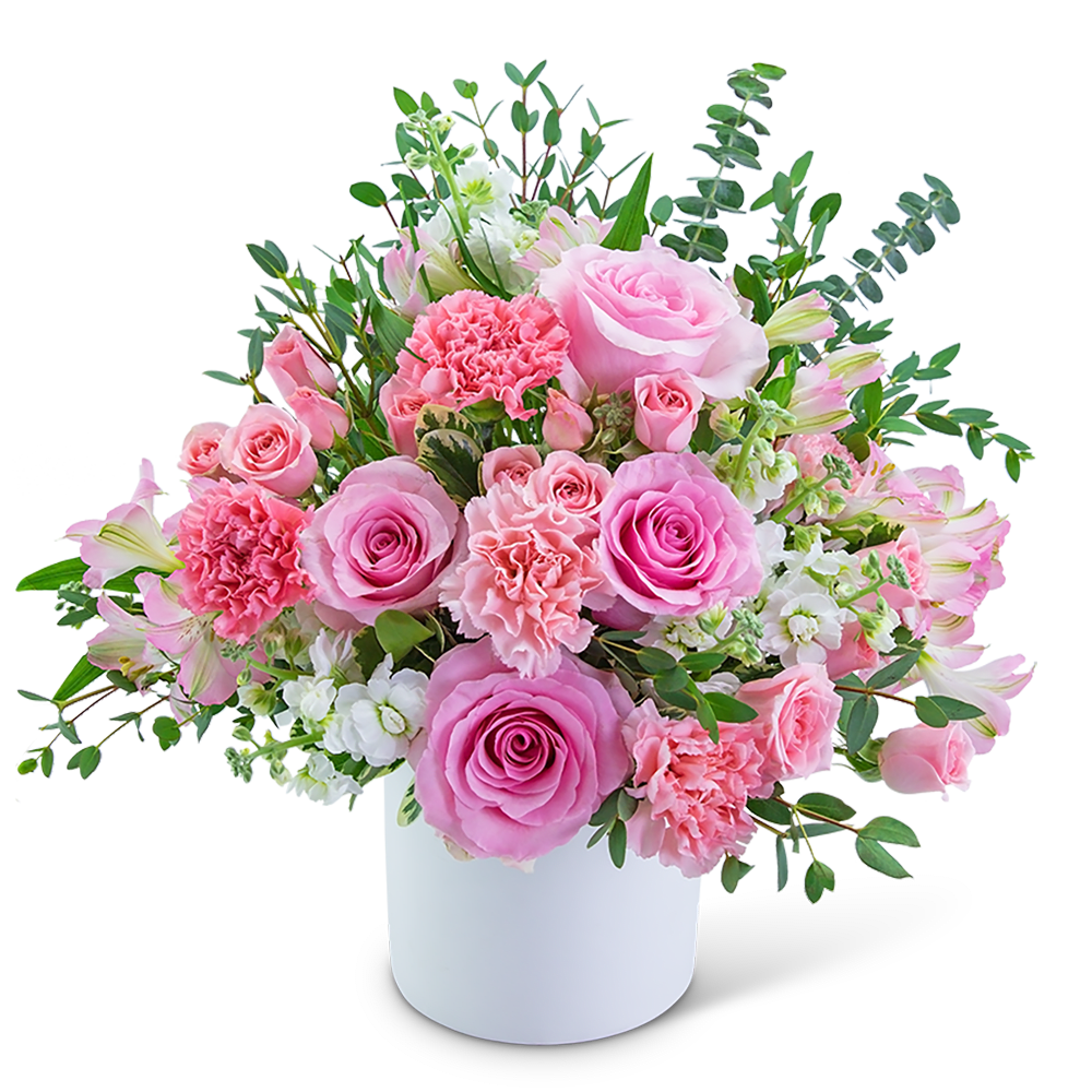Pink roses and carnations in a white vase