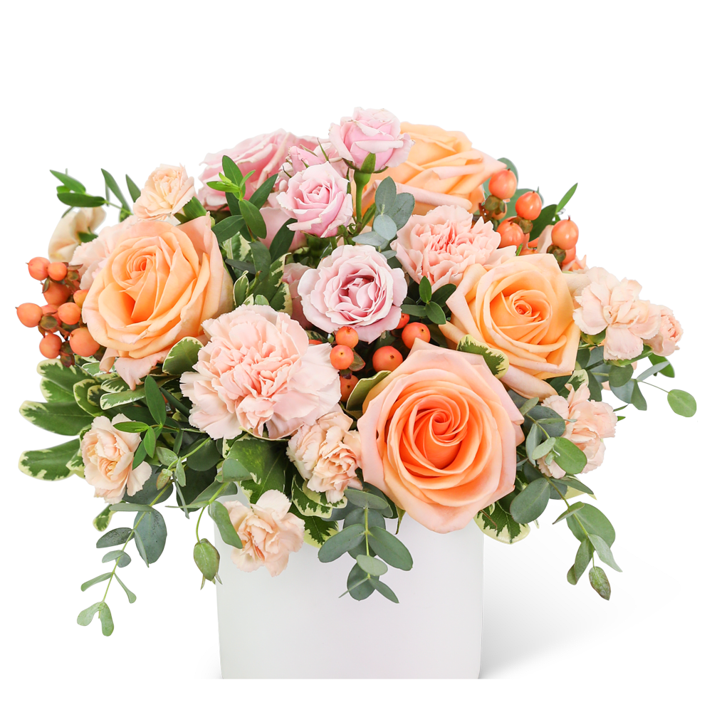 Carefree Chiffon - This soft bouquet would make anyone’s day sweeter! Carefree Chiffon features roses, carnations, hypericum berries, and assorted foliage in a modern white container. This beautiful arrangement will bring a little touch of class to any coffee table or desk and is the perfect anniversary or birthday gift.