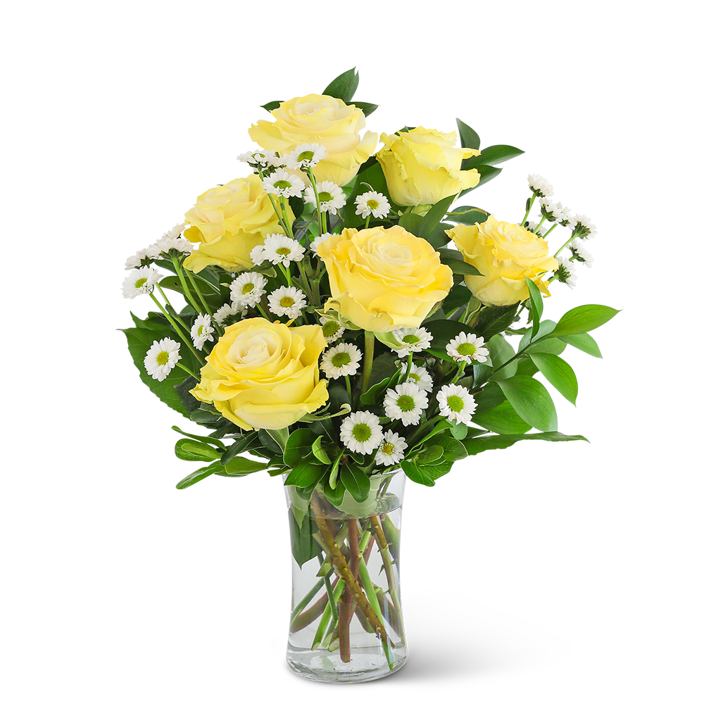 Yellow roses and white daisies in a clear glass vase