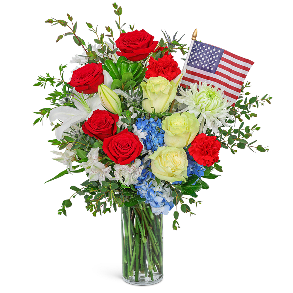 Bouquet of red, white, and blue flowers in a glass vase with a small American flag