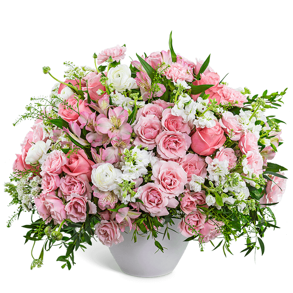 Pink and white mixed flower arrangement in a white vase