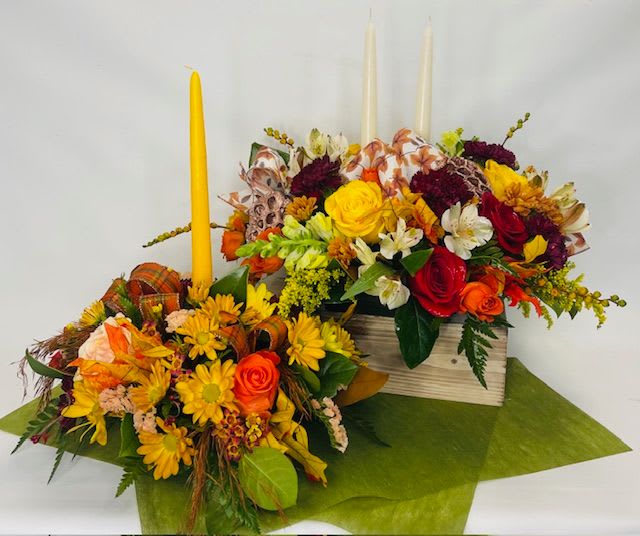 Thankful Centerpiece - Fall tones mixed with deep greens adorn this long and low centerpiece sure to brighten your holiday table.