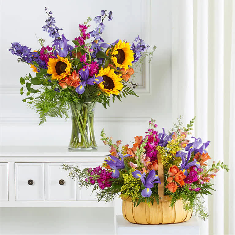 Two colorful flower arrangements with sunflowers and purple blooms, one in a glass vase and one in a basket.