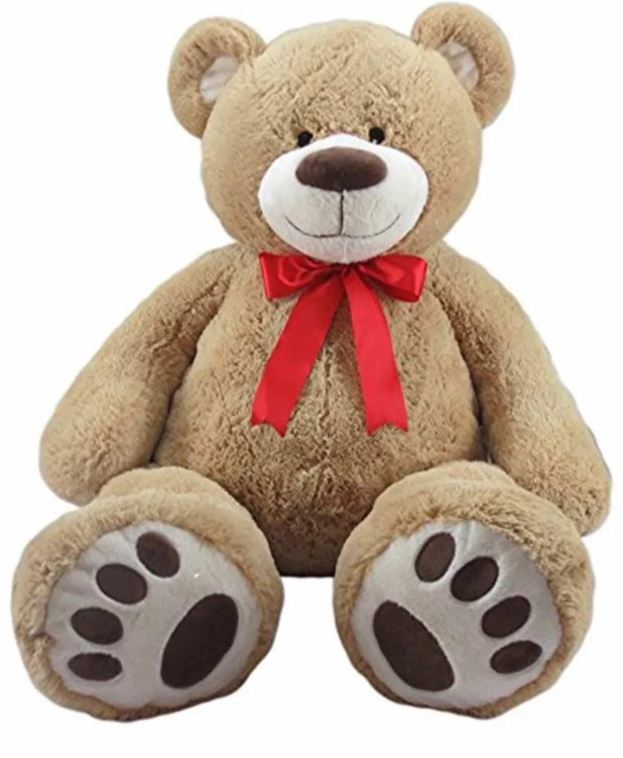 Plush teddy bear with a red ribbon bow
