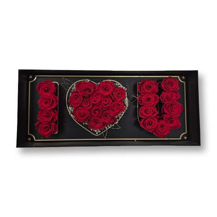 I Love You Roses - Gift a dear loved one with this ornate black box with colorful preserved roses accented with babies breath.  Approximately 4" x 24" x 20"