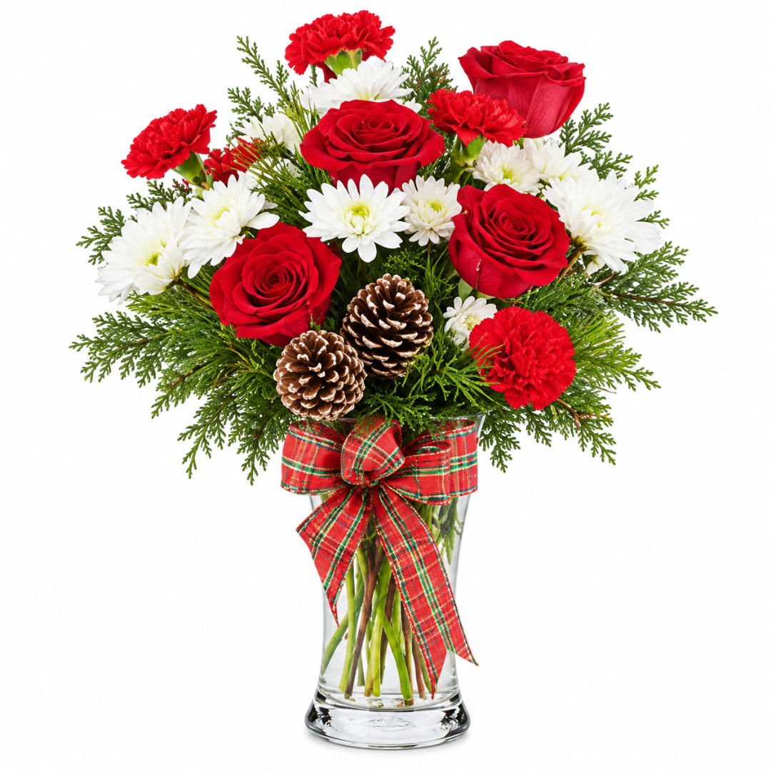 Red roses and white daisies in a glass vase with pinecones and a plaid bow