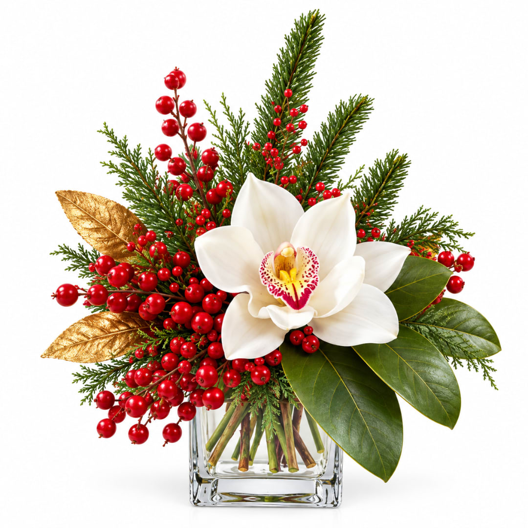 White orchid arrangement with red berries in a clear glass vase