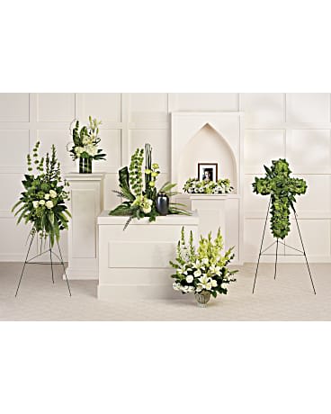 Teleflora's Tranquil Peace Collection - Calming white blooms and unique, sculptural greens give this collection of six hand-made sympathy pieces a tranquil, zen-like feel that's perfect for the service. Teleflora's Tranquil Peace Collection includes the following six sympathy set pieces: Tranquil Peace Cremation Tribute, Forever At Peace Spray, Garden Cross, Teleflora's Clouds Of Heaven Bouquet DX, Garden Wreath Photo Tribute DX, Botanical Beauty Bouquet DX