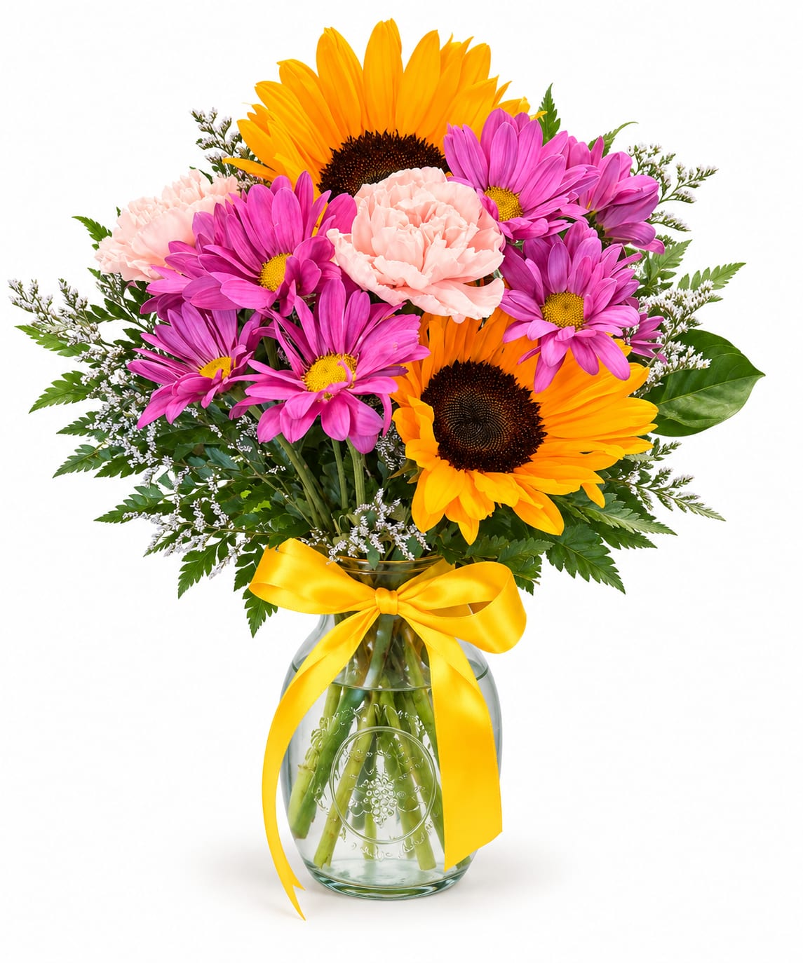 Bouquet of sunflowers, pink daisies, and carnations in a glass vase with a yellow ribbon
