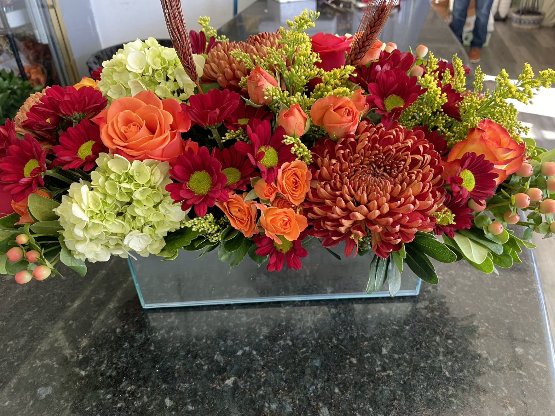  THANKSGIVING '25 Centerpiece Rectangle Table - PRE ORDER NOW - For the Table - Arranged in Mirrored Rectangle to elegantly compliment any table. Overall its 18 inches Long and about 8 inches wide.  Filled with all the colors of the season. **For thanksgiving, we suggest requesting for delivery on 25th to give the flowers time to open
