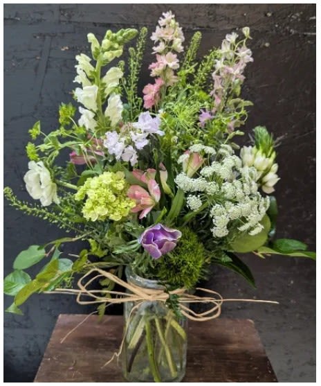 Wild Spring - WILDFLOWER DESIGN INCLUDES SNAPDRAGONS, LARKSPUR, GREEN HYDRANGEA, ALSTROEMERIA, AND A ASSORTMENT OF FRESH PICKED FLOWERS. 