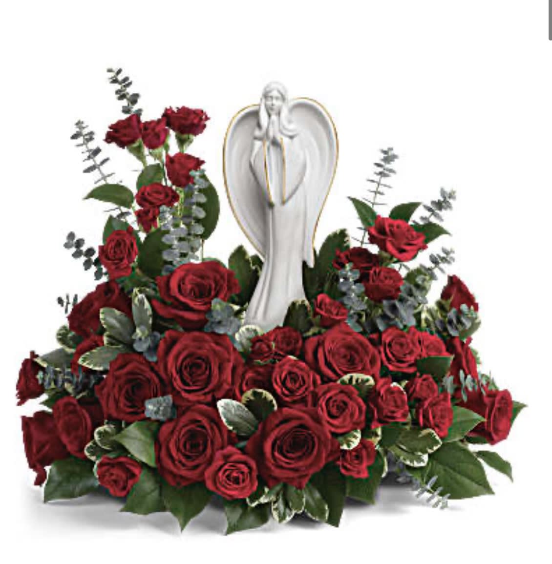 Red rose arrangement with an angel statue centerpiece
