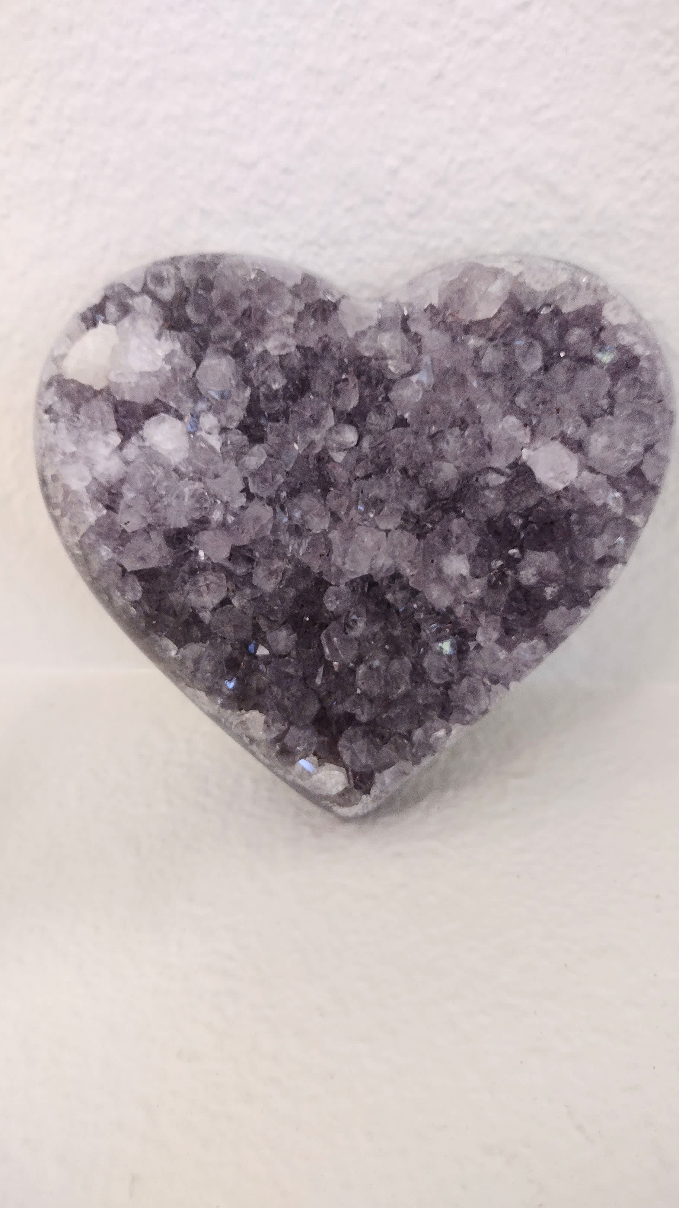 Heart-shaped crystal ornament with purple and clear stones