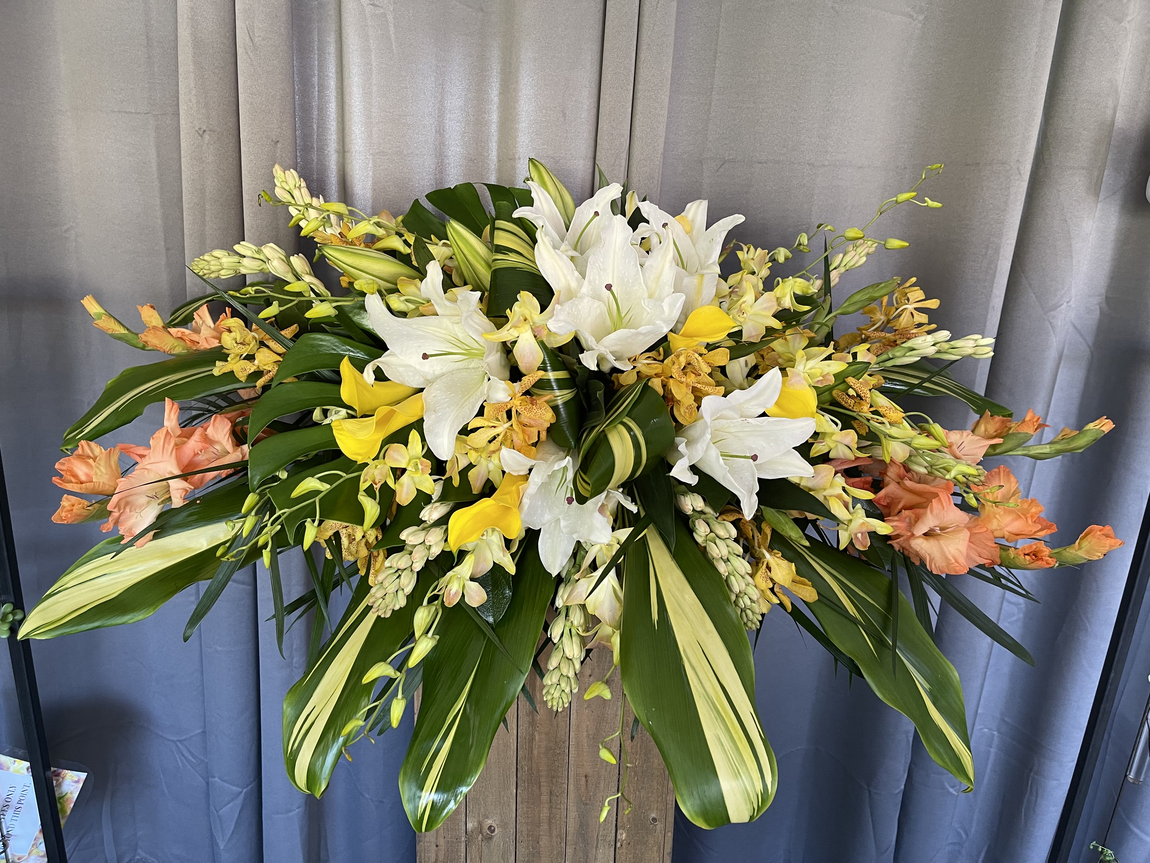Tropic Breeze Casket Flowers - A collection of nostalgic tropical flowers.