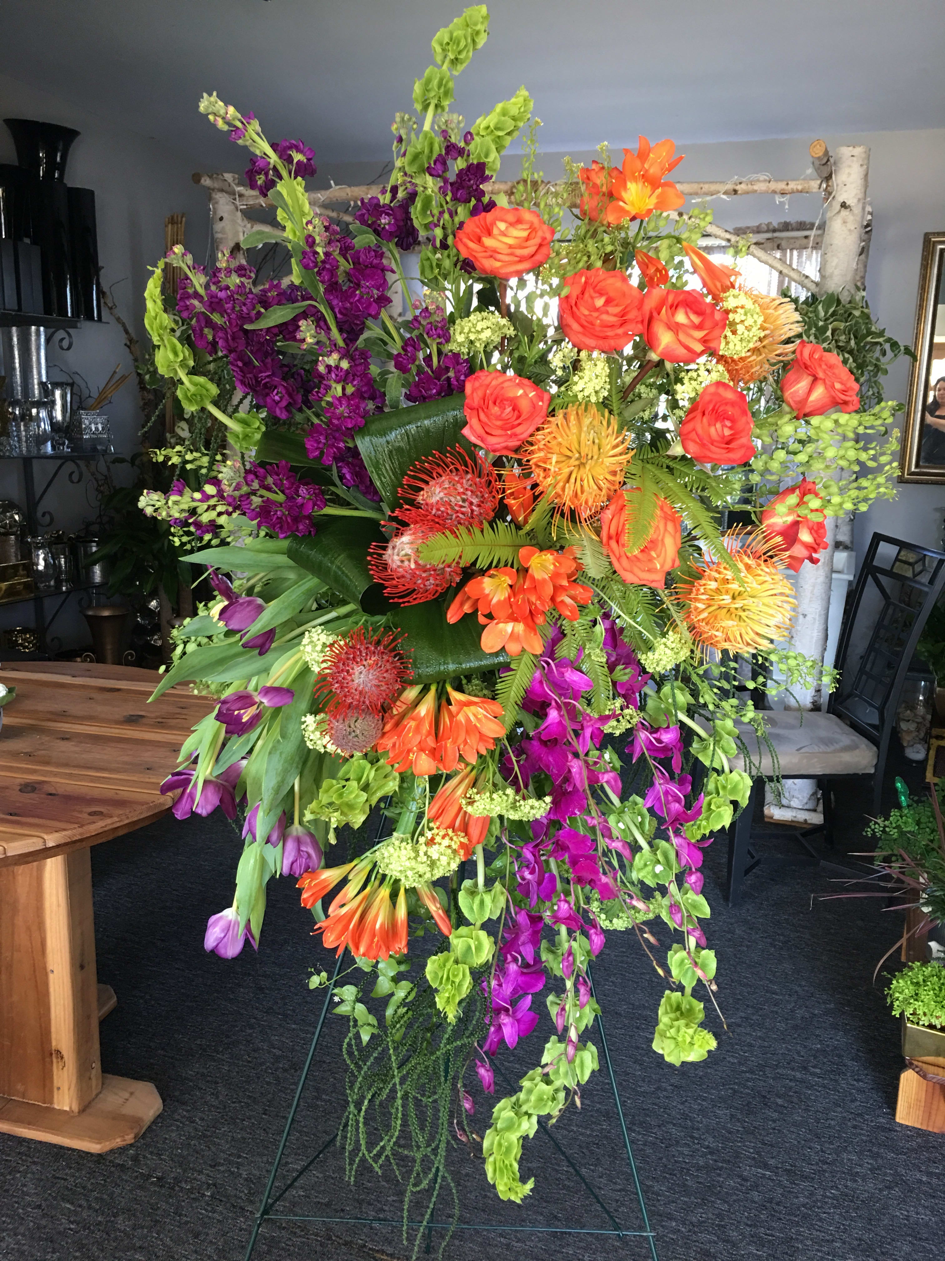 Bold &amp; Beautiful - Regal purple with a splash of citrus orange. Artfully arranged 