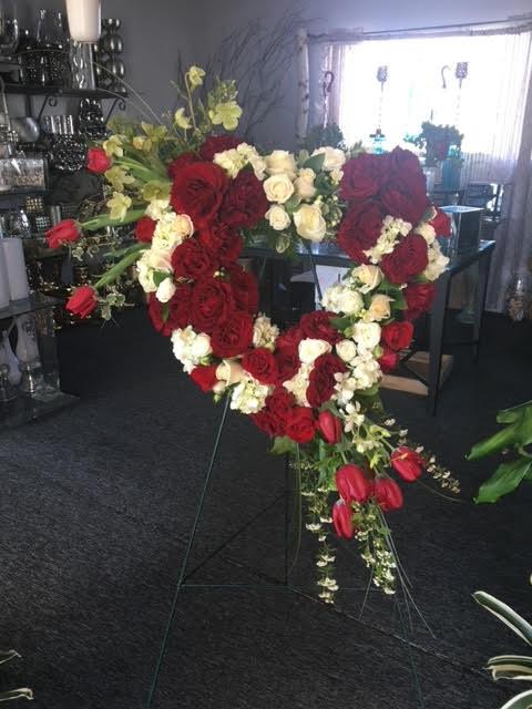 Forever Loved - The most beautiful Red and White flowers designed in a heart shape.