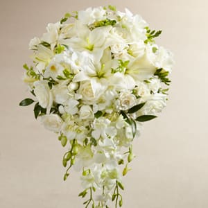 White cascading bouquet with lilies, roses, and orchids
