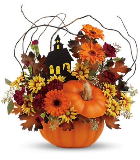 Haunted House Bouquet - This hauntingly cute arrangement brings the Halloween spirit to life with a seasonal assortment of fresh flowers, topped with a ghostly haunted house. It's hand-delivered in a charming ceramic pumpkin jar that's sure to become a fall decor staple!