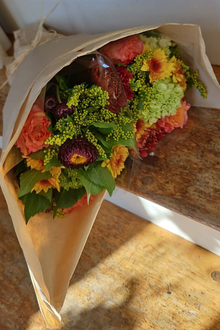 Wrapped Bouquet Fall Flowers - Let our design team create a beautiful mix of loose wrapped flowers for you!