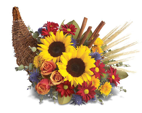  Autumn Cornucopia - Brighten any Autumn gathering with this colorful cornucopia centerpiece overflowing with fresh Autumn blooms. This annual favorite features sunflowers, roses, daisy poms, chrysanthemums, or similar Fall blossoms designed with seasonal accents.