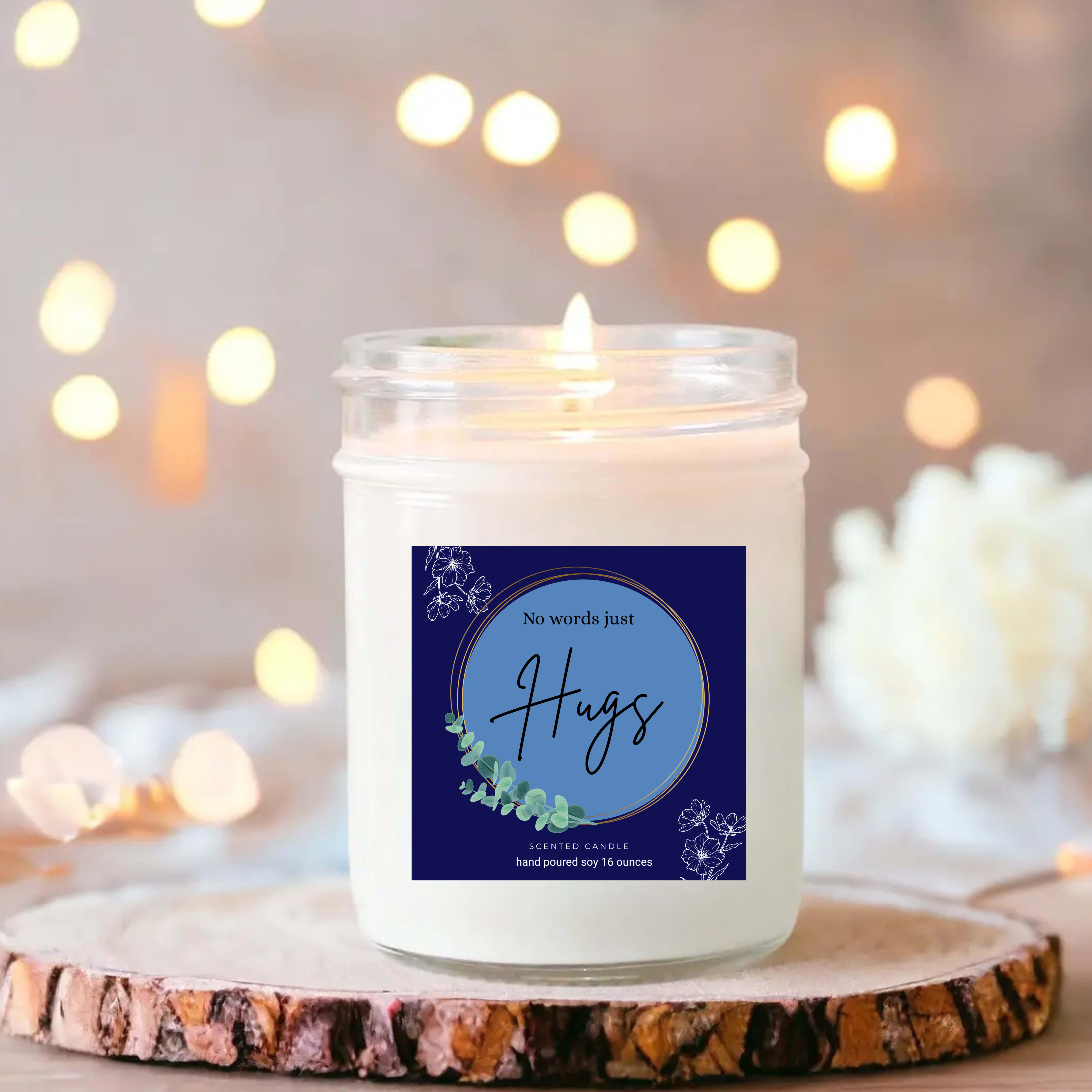 White jar candle with a "No words just Hugs" label
