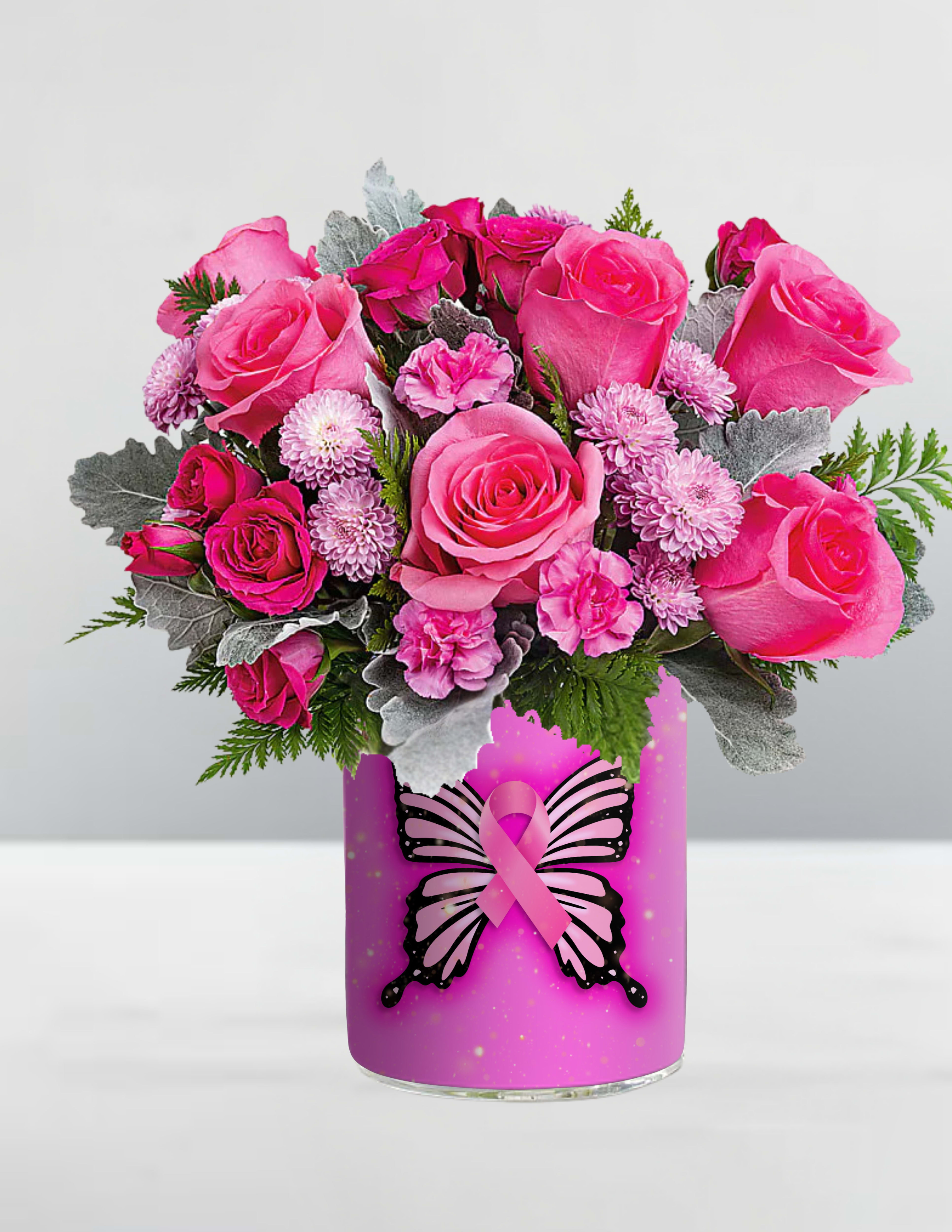 Pink roses and small pink flowers in a decorated vase with a ribbon graphic
