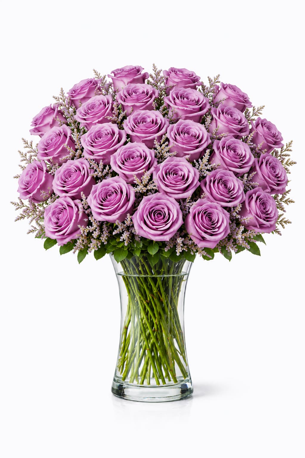 2  Dozen Lavender Roses - Lavender roses with mixed greens.  *Vase/container may vary depending on availability of stock at time of purchase. *We strive to use the flowers shown whenever possible; however, substitutions of equal or greater value may be made based on seasonal and market availability.