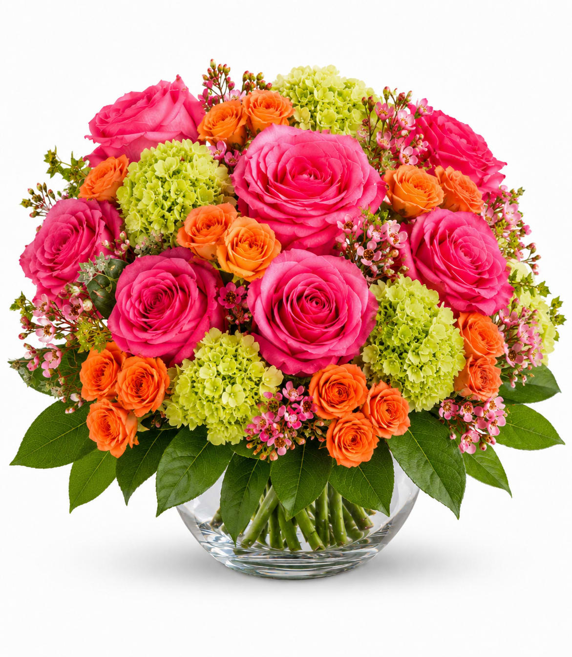 Bouquet of pink and orange roses with green hydrangeas in a glass vase