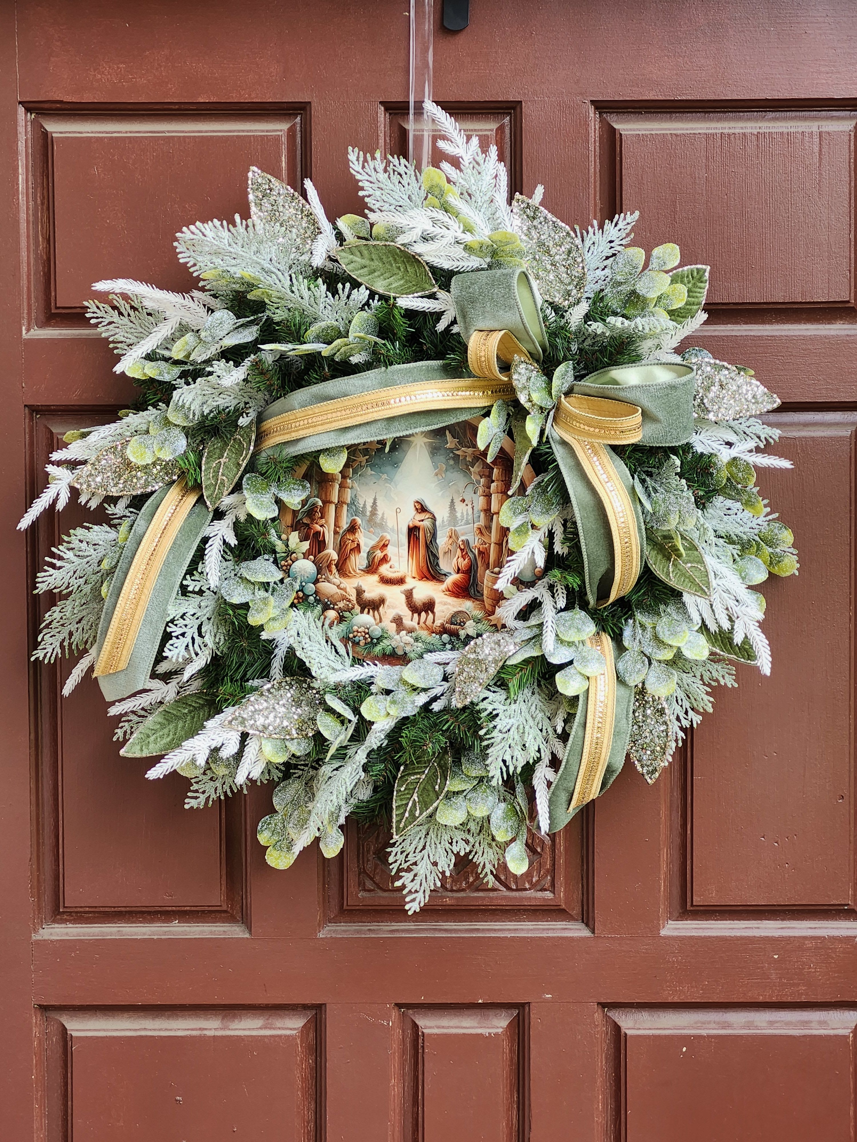 Nativity sage green wreath - Nativity metal sign with designer ribbon, glittered/velvet greenery on a evergreen base.  25"top to bottom, x 2ft. Wide, 5-6" depth.
