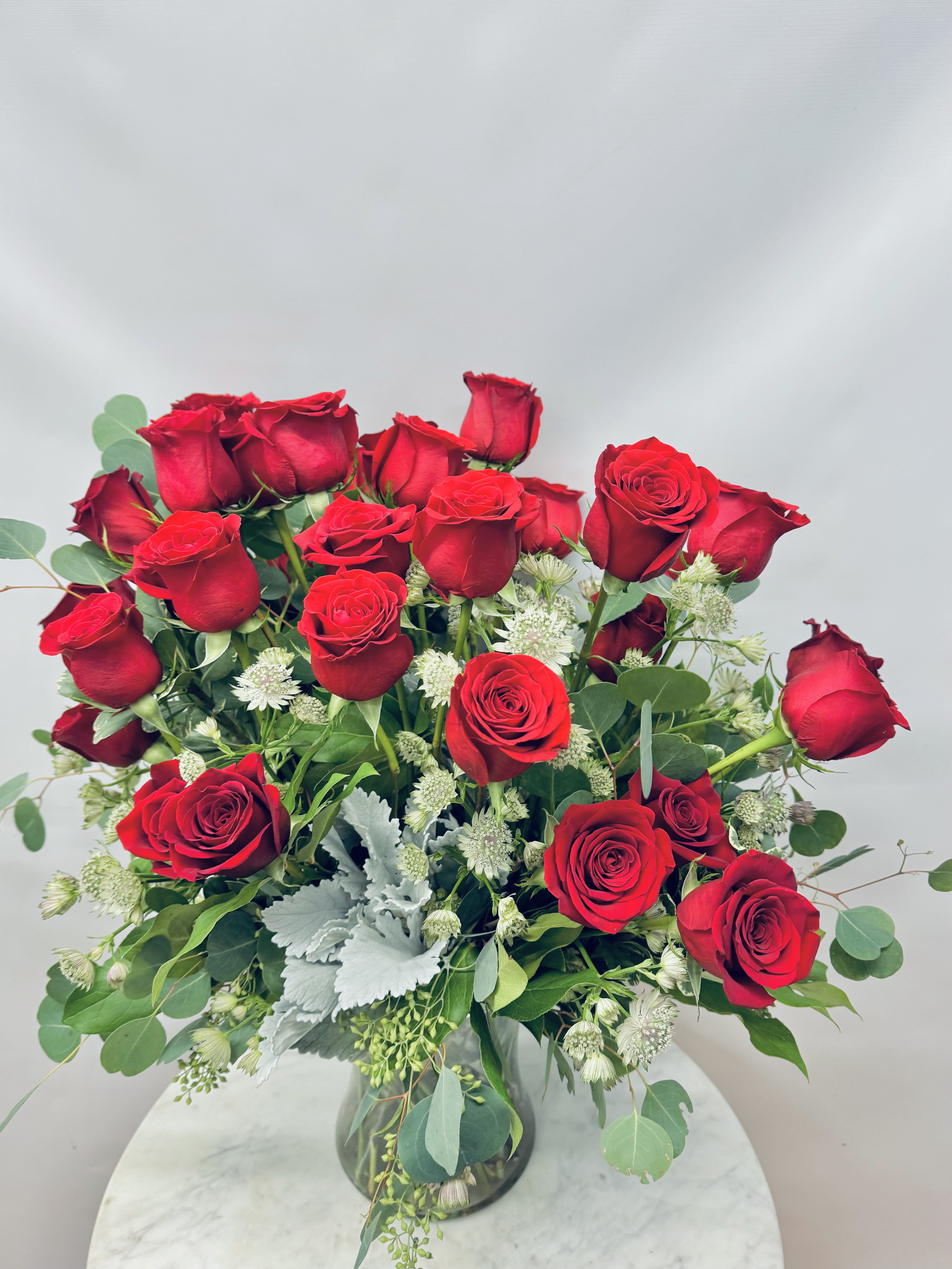 Two Dozen Long Stemmed Roses  - The classic romantic gift for your love.  *Photo shows deluxe upgrade. 