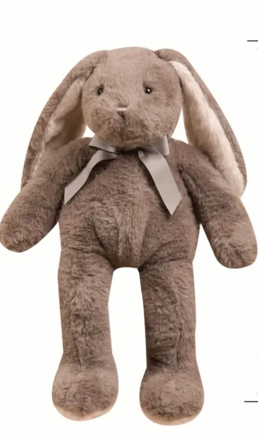 Brown plush bunny with long floppy ears and a ribbon bow