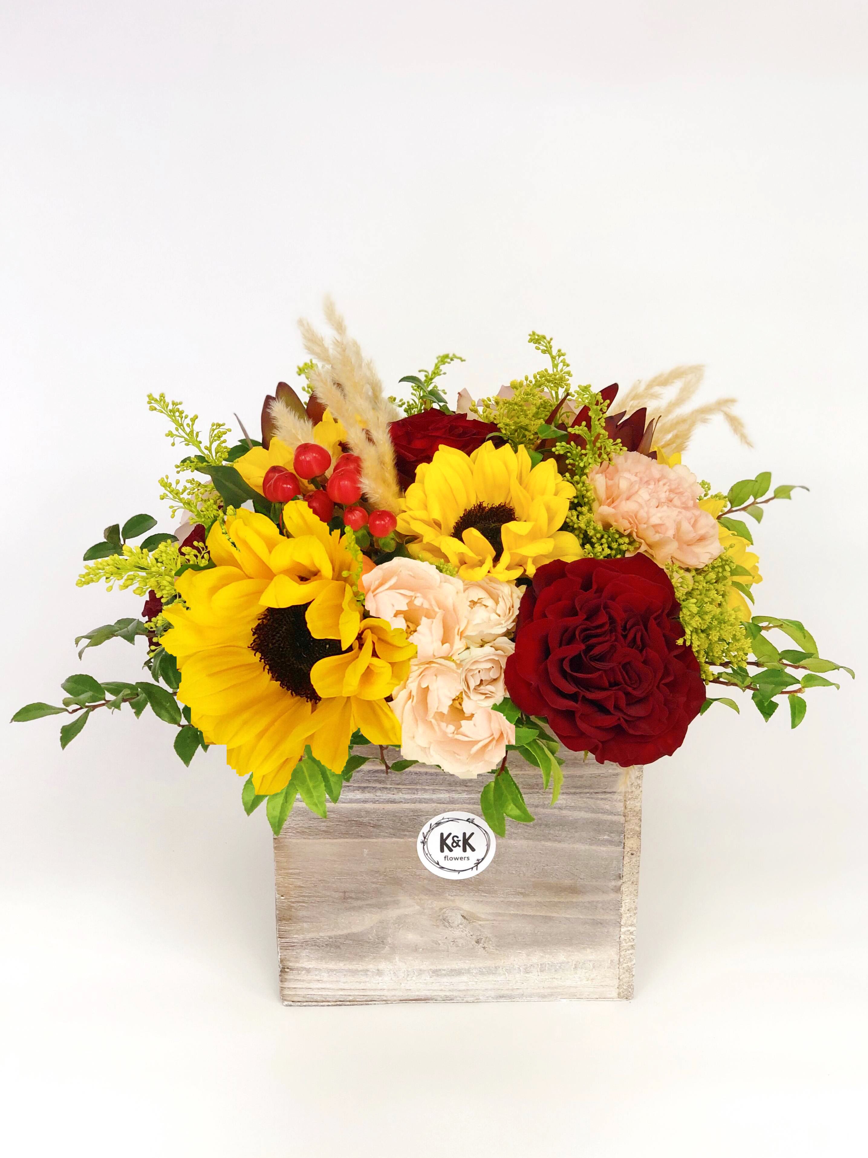  Fall wood box arrangement large - If You want bouquet with a twist, choose our flower boxes. We have wood boxes for rustic looking arrangements, or hat boxes for a more elegant look. It’s a beautiful and convenient way. Flowers in boxes don’t need vases. That makes it perfect for transportation and keeping flowers hydrated and secure.
